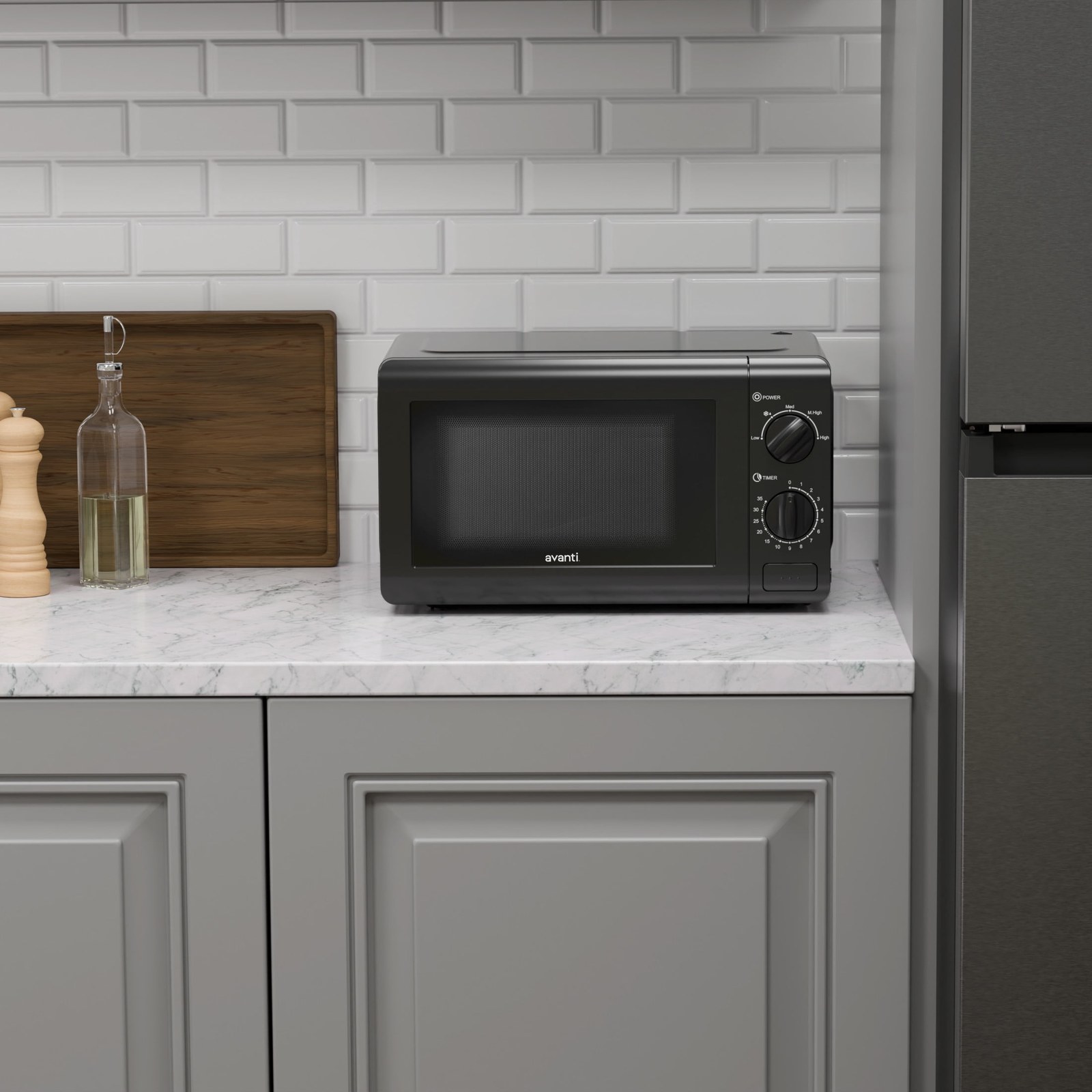 avanti mm07v1b 0 7 cu ft 700w countertop microwave oven with mechanical dials black 9c6e83 01.jpg